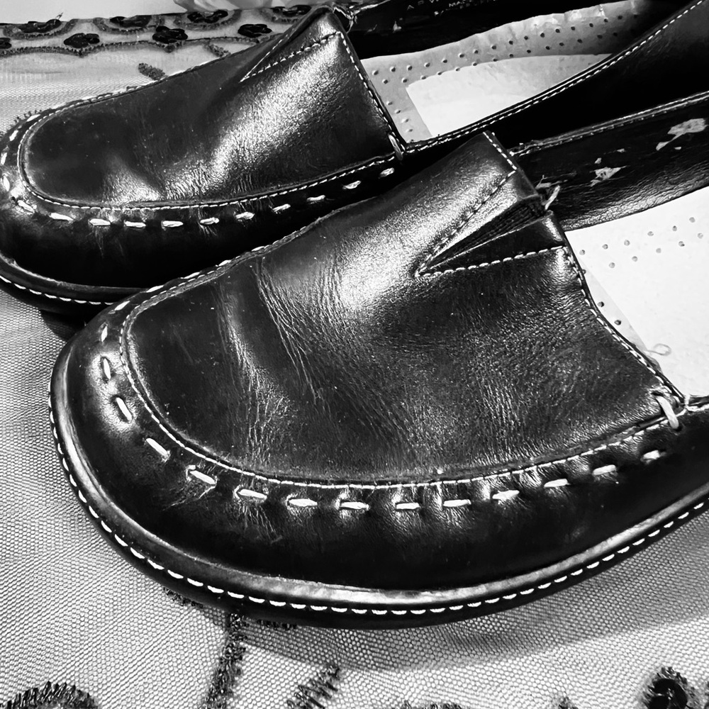 - Lady’s black Rockport leather loafers, size 8W. Wide